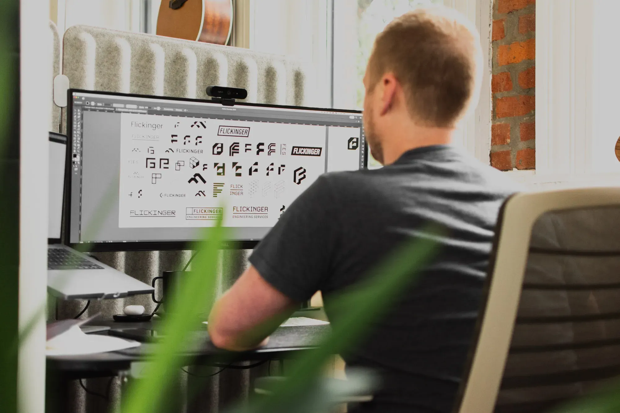 A Brave Little Beast employee designing a logo