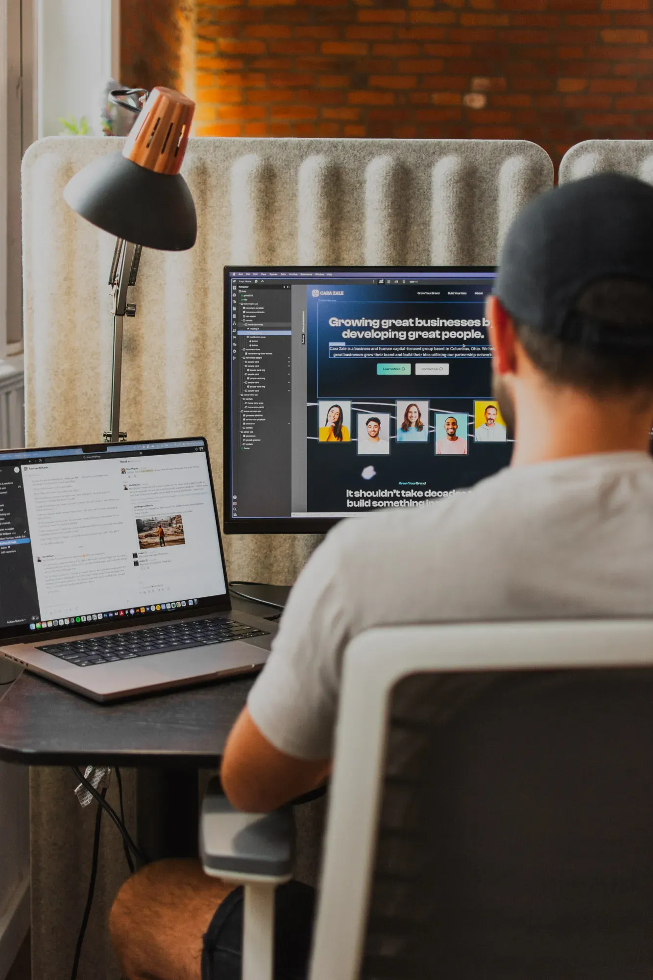 A photo of a Brave Little Beast employee working on website development in Webflow