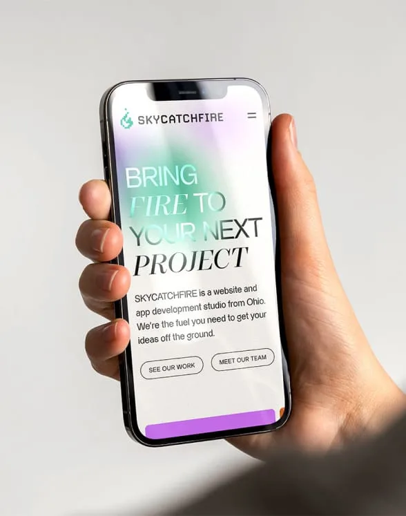 A photo of an iphone with the SKYCATCHFIRE website on it